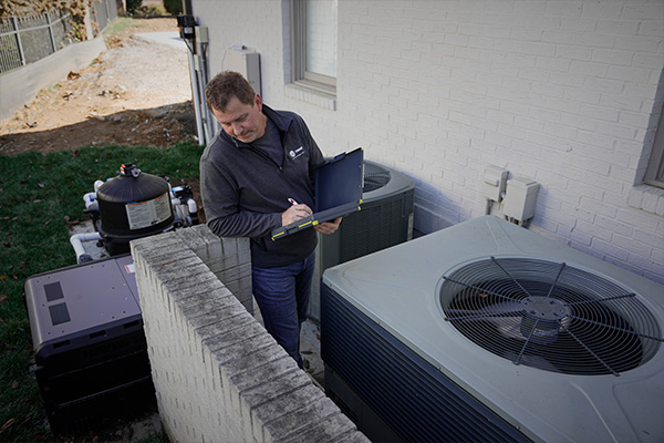 Trane rep running a check on HVAC units