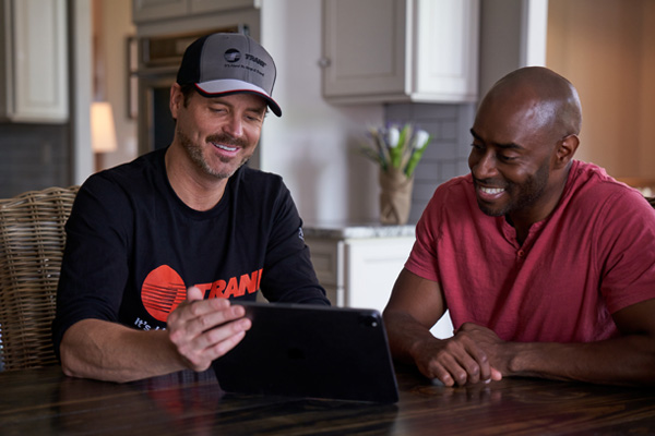 Rep with customer at table